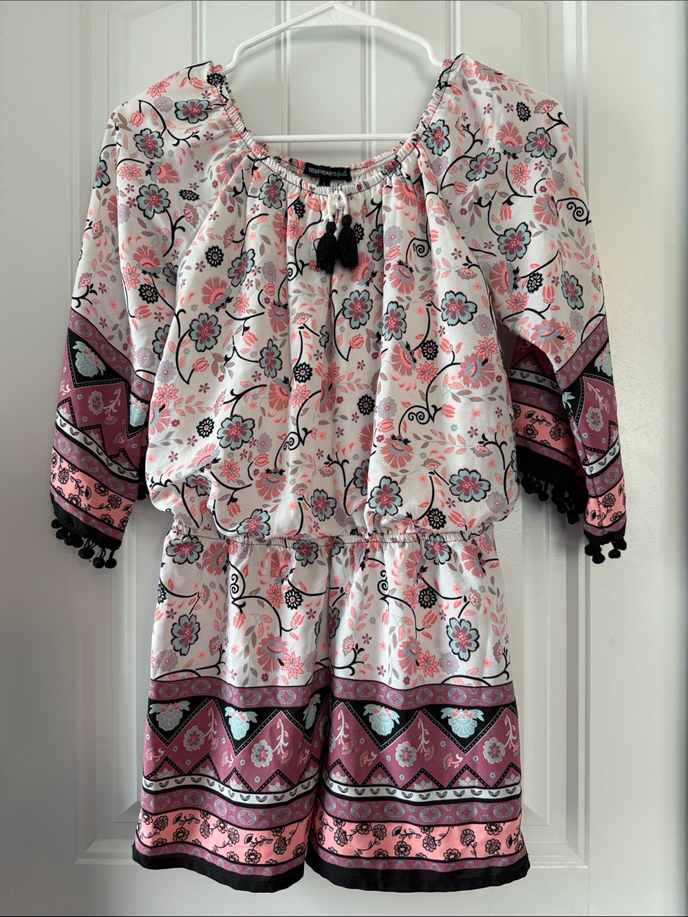 Gently worn Girls Floral Tassel Romper